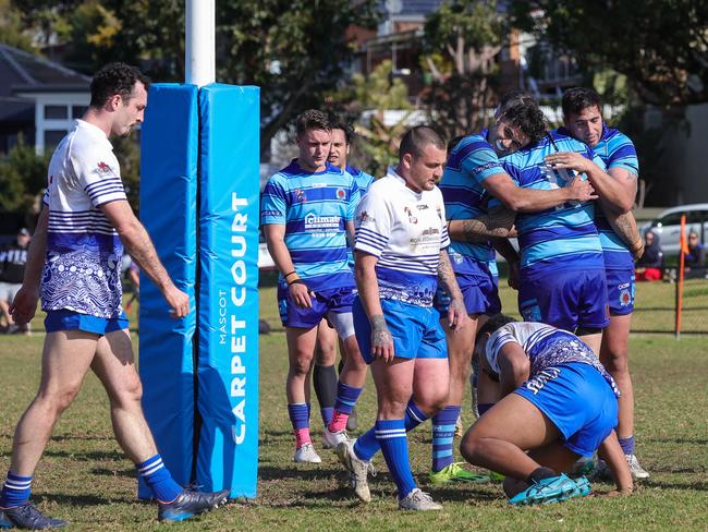 Mascot celebrate the George Lolo try. Picture: Adam Wrightson Photography