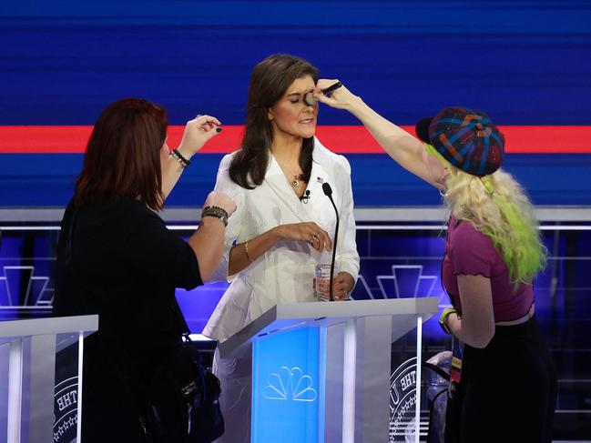 MIAMI, FLORIDA - NOVEMBER 08: Republican presidential candidate former U.N. Ambassador Nikki Haley receives a touchup during a break in the NBC News Republican Presidential Primary Debate at the Adrienne Arsht Center for the Performing Arts of Miami-Dade County on November 8, 2023 in Miami, Florida. Five presidential hopefuls squared off in the third Republican primary debate as former U.S. President Donald Trump, currently facing indictments in four locations, declined again to participate.   Joe Raedle/Getty Images/AFP (Photo by JOE RAEDLE / GETTY IMAGES NORTH AMERICA / Getty Images via AFP)