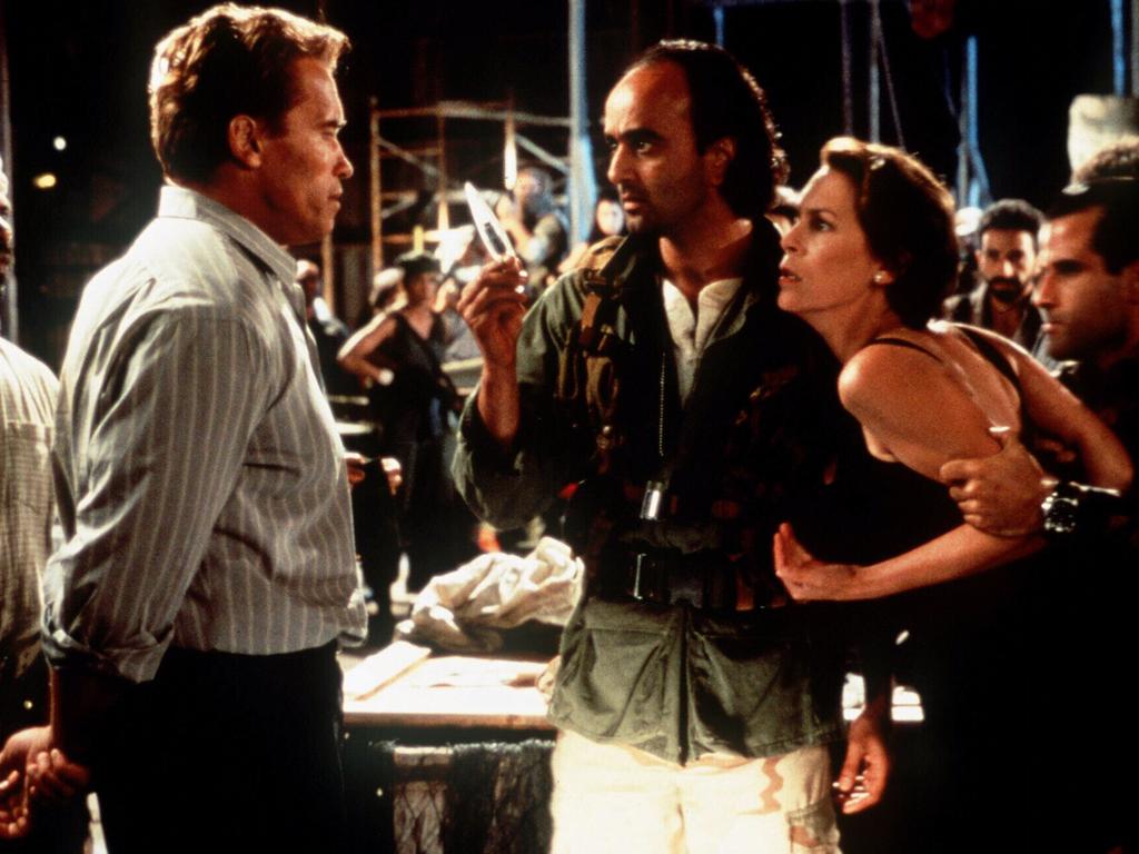 ‘You’re fired’ ... Arnold Schwarzenegger with Art Malik and Jamie Lee Curtis in True Lies.