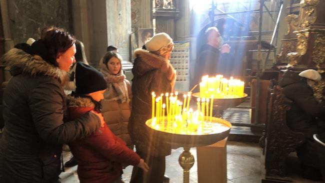 Thousands gathered to light candles for Ukrainian soldiers killed in action. Picture: Charles Miranda