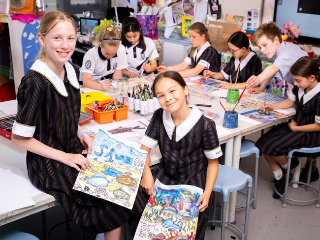 Pulteney Grammar School students Amelia Neave, 11, and Katie Hillman, 10, are involved in an exhibition to tackle the climate emergency, Create4Adelaide as part of Adelaide Festival in Adelaide/ Kaurna Yarta on Thursday, November 9, 2023. (The Advertiser/ Morgan Sette)