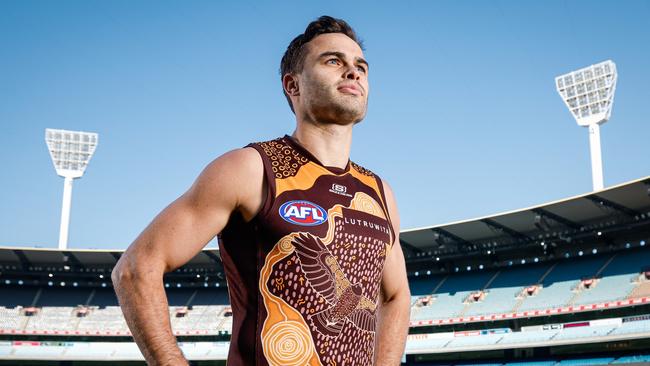 MELBOURNE, AUSTRALIA - MAY 13: Karl Amon of the Hawks poses for a photo during a Sir Doug Nicholls Round media opportunity at Melbourne Cricket Ground on May 13, 2024 in Melbourne, Australia. (Photo by Dylan Burns/AFL Photos via Getty Images)