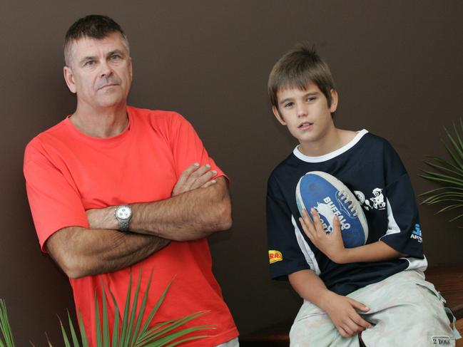 AFL Coolangatta Tweed under-12s player Hunter Battye, 11, was threatened by a father from an opposing team at a weekend game. Battye pictured with his father Howard. Picture: Sarah Marshall.