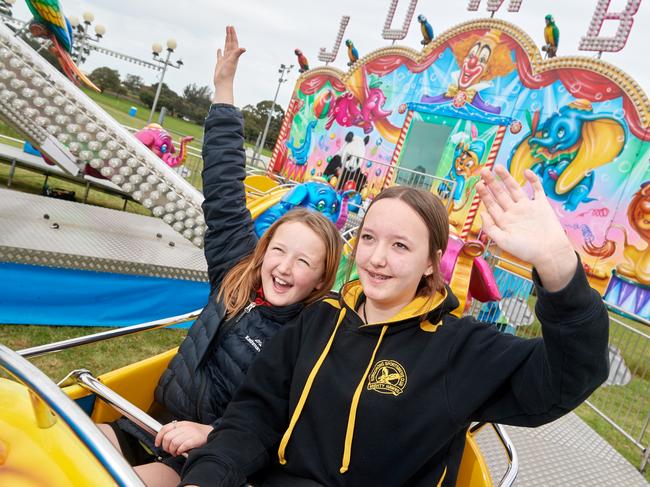 Havanah   & Zahli Beard from Mount Gambier testing out rides ahead of the Mount Gambier Show . Picture: Frank Monger