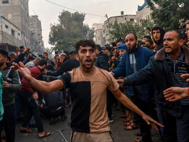 Palestinians react following Israeli bombardment in Rafah, in the southern Gaza Strip. Picture: AFP