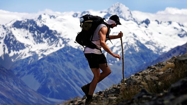 Ruckman Peter Everitt scales a peak on New Zealand’s South Island.