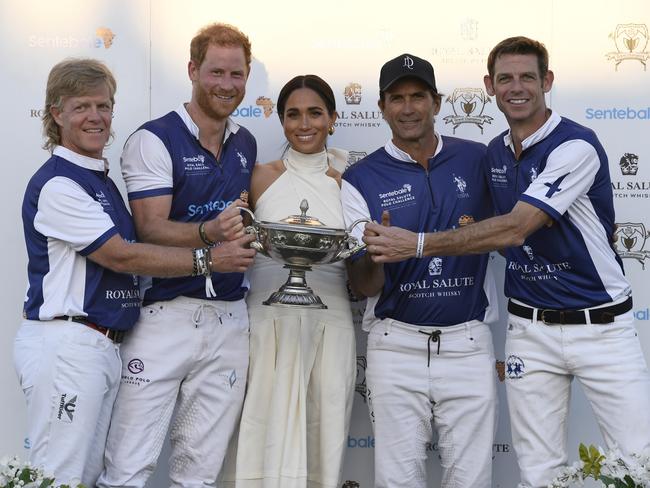 Harry and Meghan at the Royal Salute Polo Challenge in Florida in April 2024, which has raised £11.4 million ($A22.8m) to support Sentebale's work since 2010. Picture: Getty Images