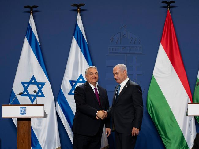 Hungarian Prime Minister Viktor Orban, left, and Israeli Prime Minister Benjamin Netanyahu shake hands after a press statement at the Carmelite Monastery in the Buda Castle in Budapest, Hungary. Picture: AP