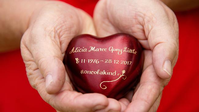 Alicia's mother, Lee, holds Alicia's ashes. Picture: Mark Stewart