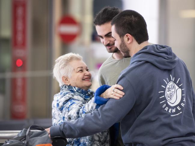 Passengers were overjoyed to see their families. Picture: NCA NewsWIRE / Monique Harmer