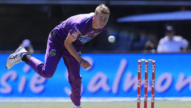 Hobart’s Riley Meredith bowls during the Big Bash League match between Hobart and the Melbourne Renegades at Blundstone Arena. Picture: AAP/ROB BLAKERS