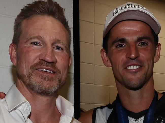 MELBOURNE , AUSTRALIA. September 30, 2023. AFL Grand Final between Collingwood and the Brisbane Lions at the MCG.   Scott Pendlebury of the Magpies with Nathan Buckley   .Picture by Michael Klein