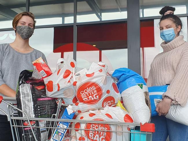 Chloe Beck and Rhiannon Stoneman grabbing some last-minute groceries at Wodonga Coles.