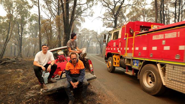 Mark Knight, with his sons Jack and Elliott in Tonimbuk, managed to save their property. Picture: Stuart McEvoy