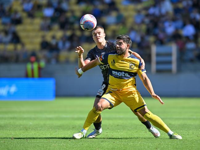 Wellington’s Ben Old (left) battles with the Mariners’ Christian Theoharous in Tuesday’s 0-0 draw at Sky Stadium. Picture: Mark Tantrum/Getty Images