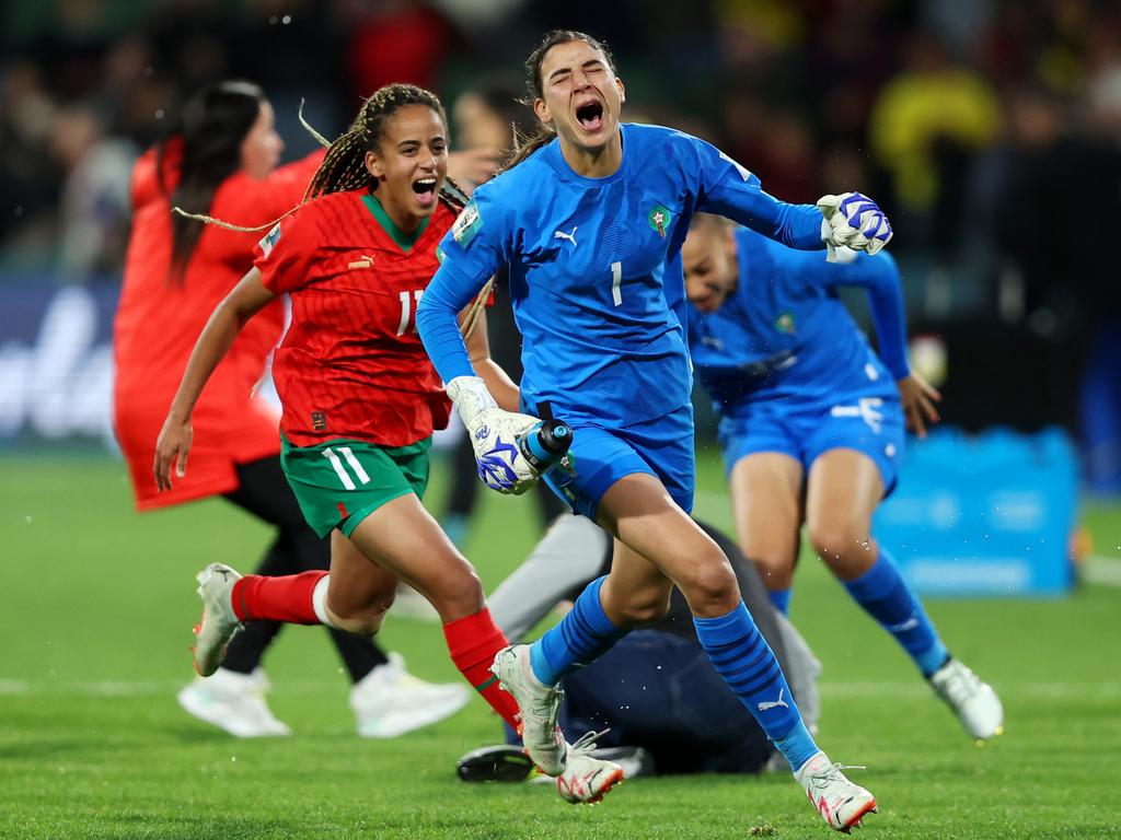 Khadija Er-Rmichi and Fatima Tagnaout of Morocco celebrate advancing to the knockout stage after a 1-0 victory against Colombia in Perth. Picture: Paul Kane/Getty Images