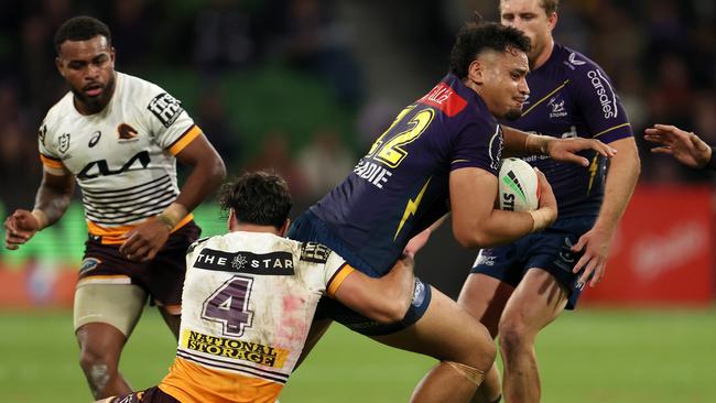 MELBOURNE, AUSTRALIA - MAY 11:  Eliesa Katoa of the Storm is tackled during the round 11 NRL match between Melbourne Storm and Brisbane Broncos at AAMI Park on May 11, 2023 in Melbourne, Australia. (Photo by Robert Cianflone/Getty Images)