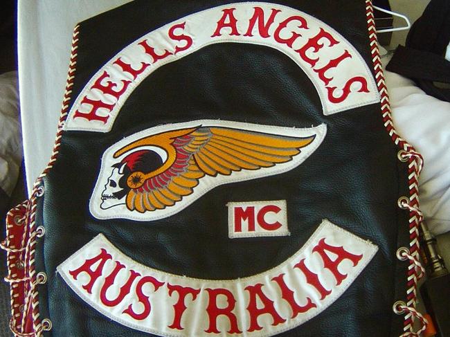 Hells Angels bikie charged over wild prison brawl