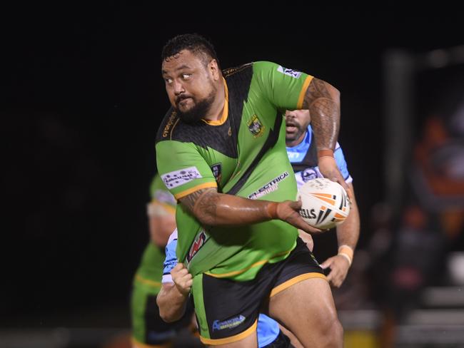 Palmerston Raiders Joel Turaga breaks through the Northern Sharks line in the NRLNT Grand Final 2022. Picture: (A)manda Parkinson