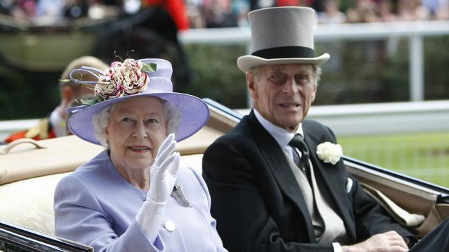 The Queen arrives with Prince Philip, by horsedrawn carriage for the third day of the Royal Ascot meeting in 2010. Picture: AP Photo–Alastair Grant