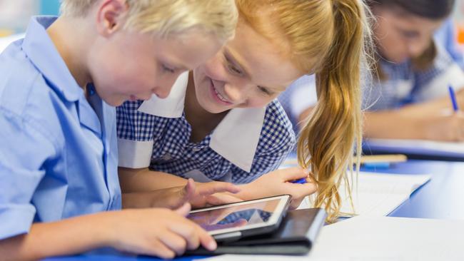 Students using an iPad in class. Picture: Istock