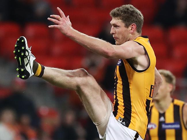 Ben McEvoy slots a goal against the Giants. Pictures: Mark Kolbe/Getty Images