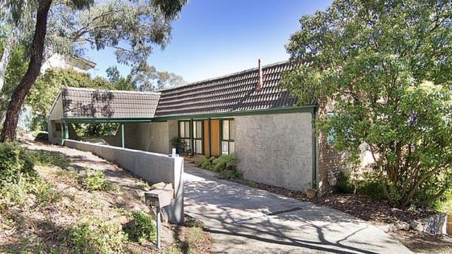 Llewella Grillo has pleaded guilty to using forged documents to trick her former landlord into moving into this property overlooking a nature reserve in the Canberra suburb of Chapman. Picture: Supplied/Allhomes