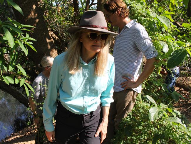 Territory Coroner Elisabeth Armitage inspects the site where Shane Tapp’s belongings were found on the bank of the Katherine River. Picture: Jason Walls