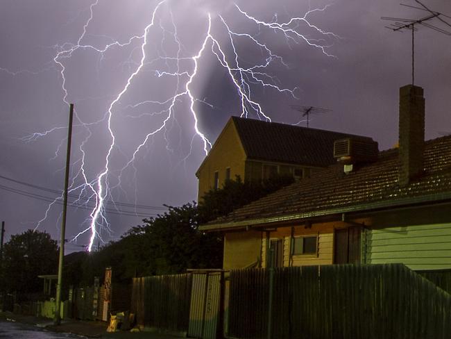 Storms lash Melbourne in the early hours of Monday morning with heavy rains, lightning and wind. Images taken in Coburg. Picture: Jason Edwards