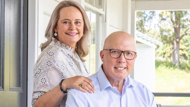 Opposition Leader Peter Dutton with his wife Kirrily and their dog Ralph at their Queensland property, north of Brisbane. Picture: Paul Harris