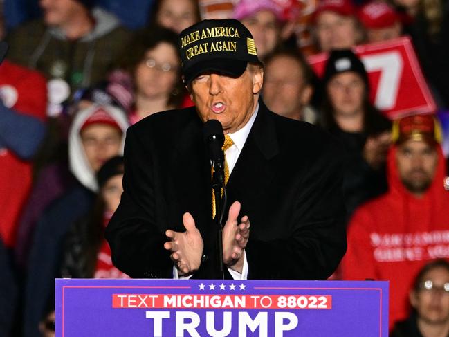 Former US President Republican presidential candidate Donald Trump speaks during a campaign rally in Traverse City, Michigan on October 25, 2024. (Photo by Jim WATSON / AFP)