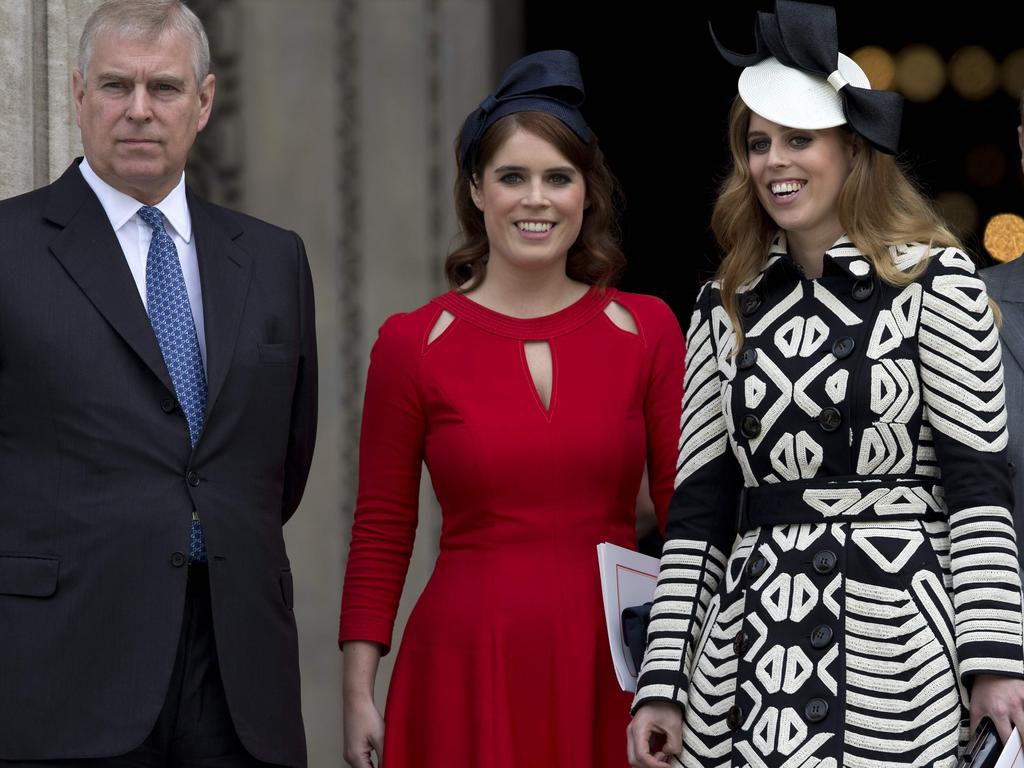 Prince Andrew and daughters Princess Eugenie (centre) and Princess Beatrice. Picture: AFP