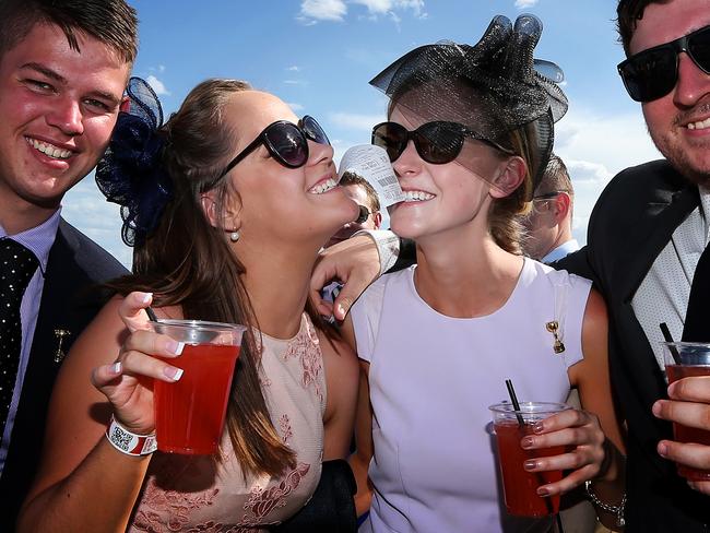 Melbourne Cup Day 2014 at Flemington Racecourse. Punters start to get a little raucous after the cup. Picture: Mark Stewart