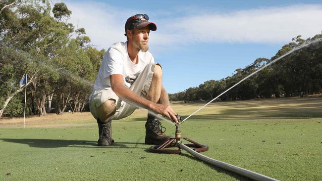 Belair Golf Club groundskeeper Steve Palmer is the last man standing in a bid to keep the area around the clubhouse from dying off. Picture: AAP/Dean Martin