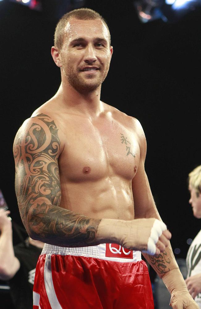 Quade Cooper after beating  Barry Dunnet in the ring. Picture: Jono Searle