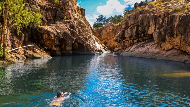 The Gunlom Falls, which features cascading waters and pristine plunge pool, were closed to the public in 2019. . Picture: Sam Earp/Tourism NT