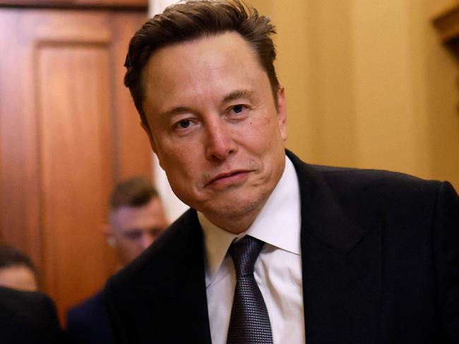 WASHINGTON, DC - DECEMBER 05: Tesla CEO Elon Musk, Co-Chair of the newly announced Department of Government Efficiency (DOGE), arrives on Capitol Hill on December 05, 2024 in Washington, DC. Musk and his Co-Chair, businessman Vivek Ramaswamy are meeting with lawmakers today about DOGE, a planned presidential advisory commission with the goal of cutting government spending and increasing efficiency in the federal workforce.   Anna Moneymaker/Getty Images/AFP (Photo by Anna Moneymaker / GETTY IMAGES NORTH AMERICA / Getty Images via AFP)