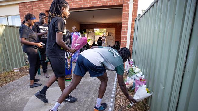 Floral tributes were laid in memory of the young men. Picture: Mark Stewart