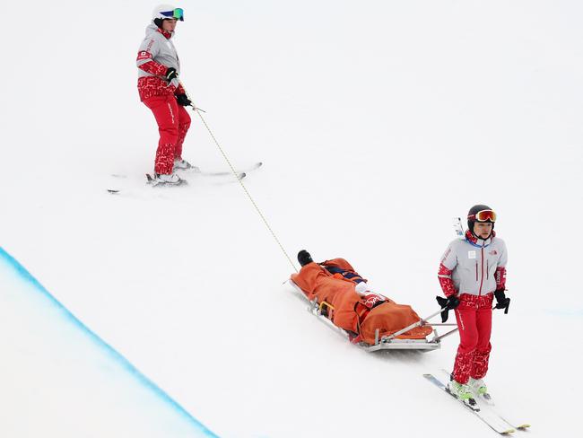 Yuto Totsuka of Japan is stretched off by medical staff after crashing in the during the Snowboard Men’s Halfpipe Final on day five of the PyeongChang 2018 Winter Olympics at Phoenix Snow Park on February 14, 2018 in Pyeongchang-gun, South Korea. Picture: Getty Images