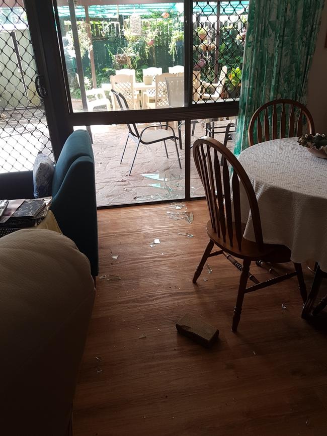 A brick was thrown through a glass window to gain access into Rosemary Iloste's home in Mooroobool. Picture: Supplied.