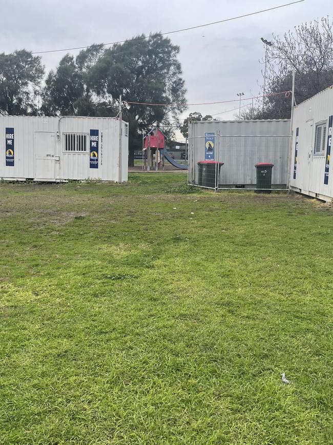 The shipping containers being used as change rooms.