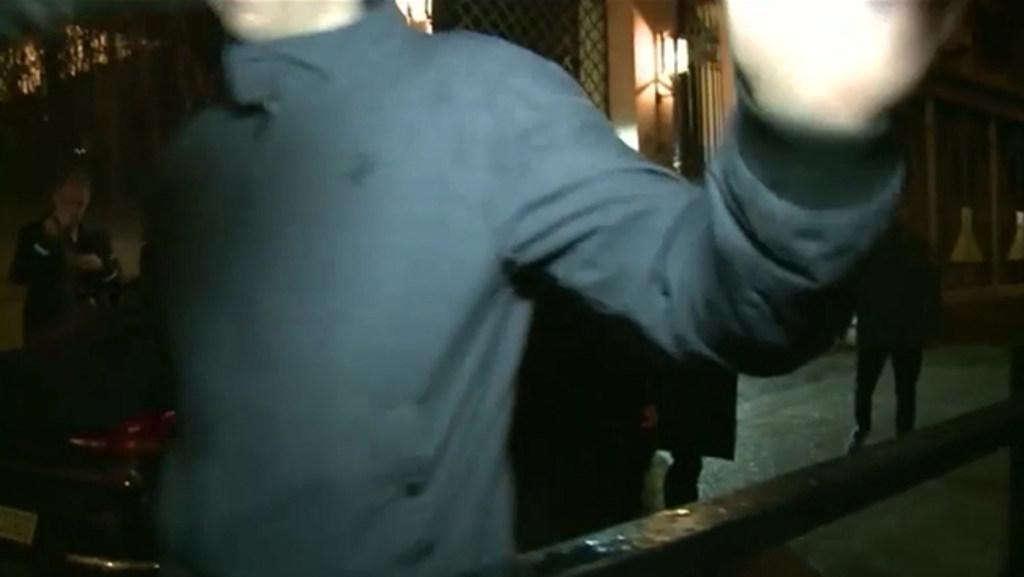 Security shoves camera crew filming Pell's arrival