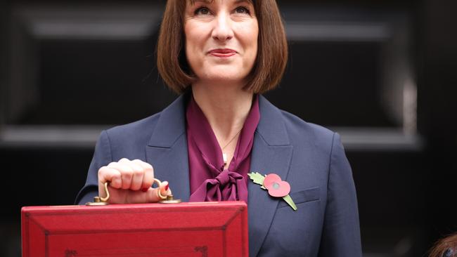 Chancellor Rachel Reeves poses outside number 11 Downing Street in London ahead of Britains’ budget on Wednesday. (Photo by Dan Kitwood/Getty Images)