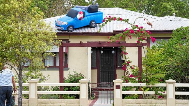 PHOTO SMART: Just in case your home does not sell before December 25, get all the photos taken before putting the Santa Car on the roof. Picture: Trevor Veale