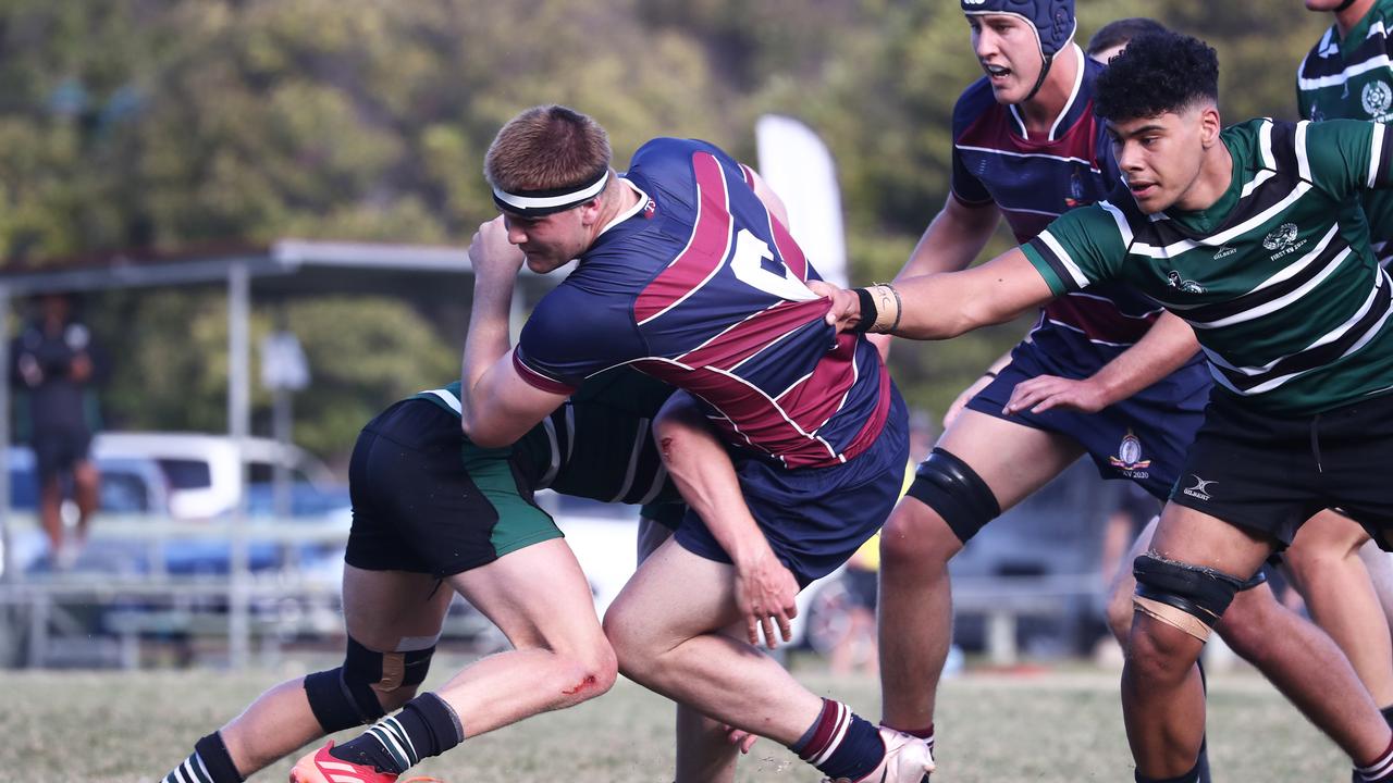 Nick Hilton of TSS runs with the ball against BBC during their GPS Rugby clash. Photograph : Jason O'Brien