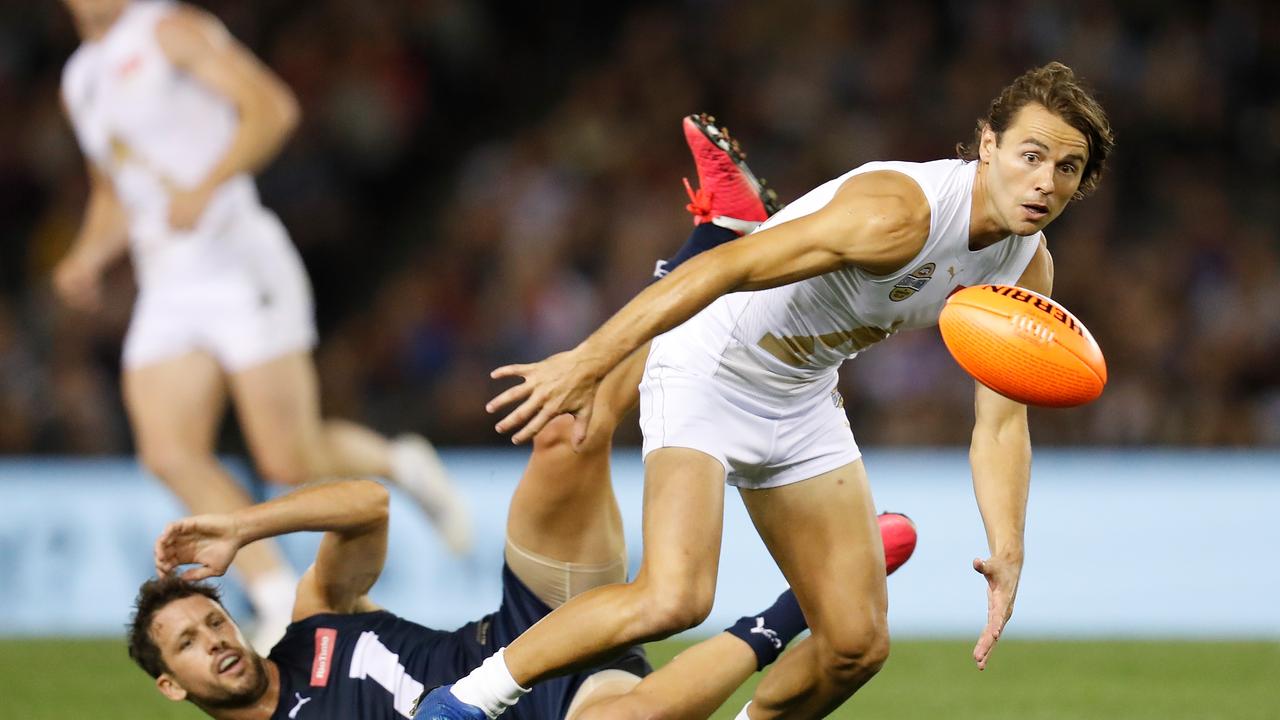 Lachie Weller and Travis Boak compete for a ball in State of Origin.