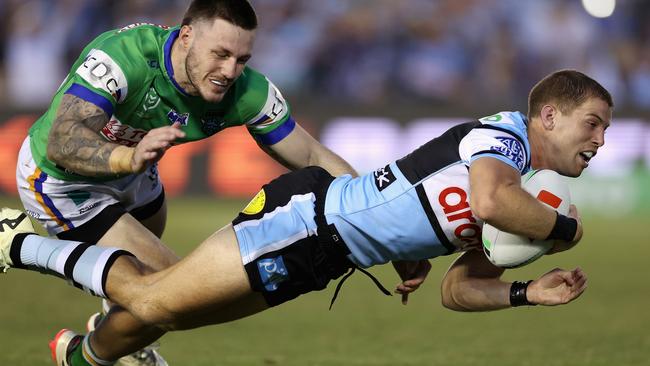 SYDNEY, AUSTRALIA - MARCH 31: Blayke Brailey of the Sharks scores a try during the round four NRL match between Cronulla Sharks and Canberra Raiders at PointsBet Stadium, on March 31, 2024, in Sydney, Australia. (Photo by Cameron Spencer/Getty Images)