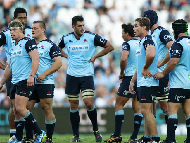 Dejected Waratahs players look on during the NSW Waratahs v Melbourne Rebels Super Rugby match at Allianz Stadium, Sydney. Pic Brett Costello