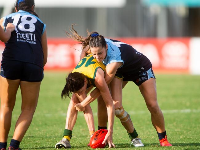 Dom Carbone showing her typical toughness in defence during the 2020-21 NTFL Women’s Premier League Grand Final. Picture: Che Chorley