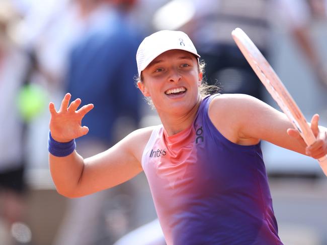 PARIS, FRANCE - JUNE 06: Iga Swiatek of Poland celebrates winning match point against Coco Gauff of United States during the Women's Singles Semi-Final match on Day 12 at Roland Garros on June 06, 2024 in Paris, France. (Photo by Dan Istitene/Getty Images)